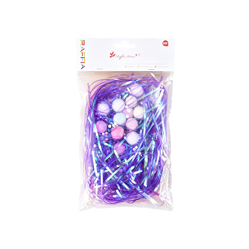 Schillernde Garn- und Pompon-Mischverpackung